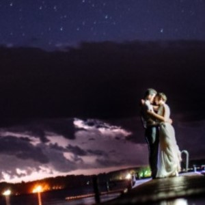 bride and groom on the dock